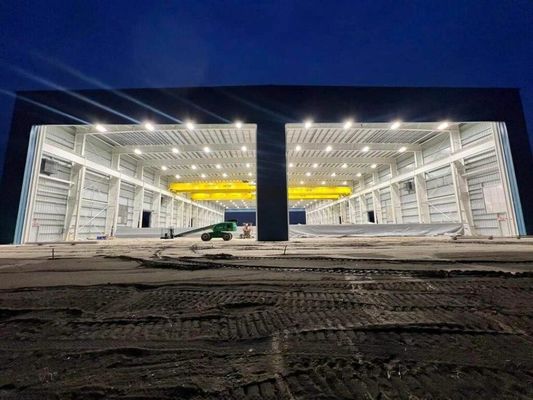 Moderni edifici prefabbricati in metallo costruzione struttura in acciaio prefabbricata hangar aereo